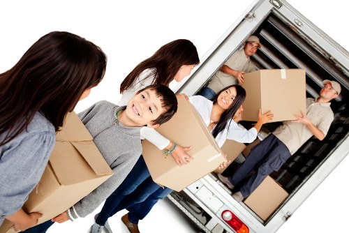 Local movers in London handling a home relocation on a city street