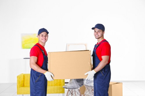Packed boxes and furniture ready for transport in a London home move
