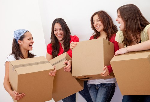 Loading furniture into a truck for a London removal job