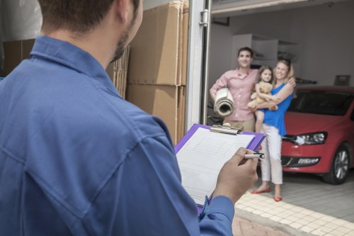 Removal team planning a move in a busy London street with access challenges