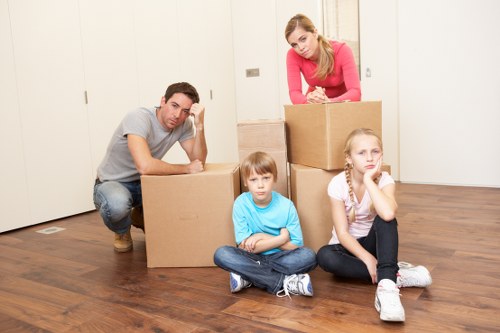 Man with van loading furniture for a London home move