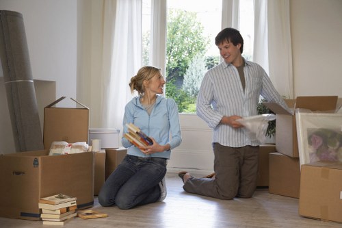 Boxes and furniture ready for house removals in a London flat