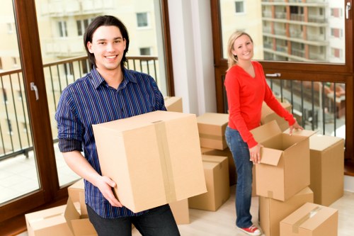 Unpacking service helping a family settle into a London property
